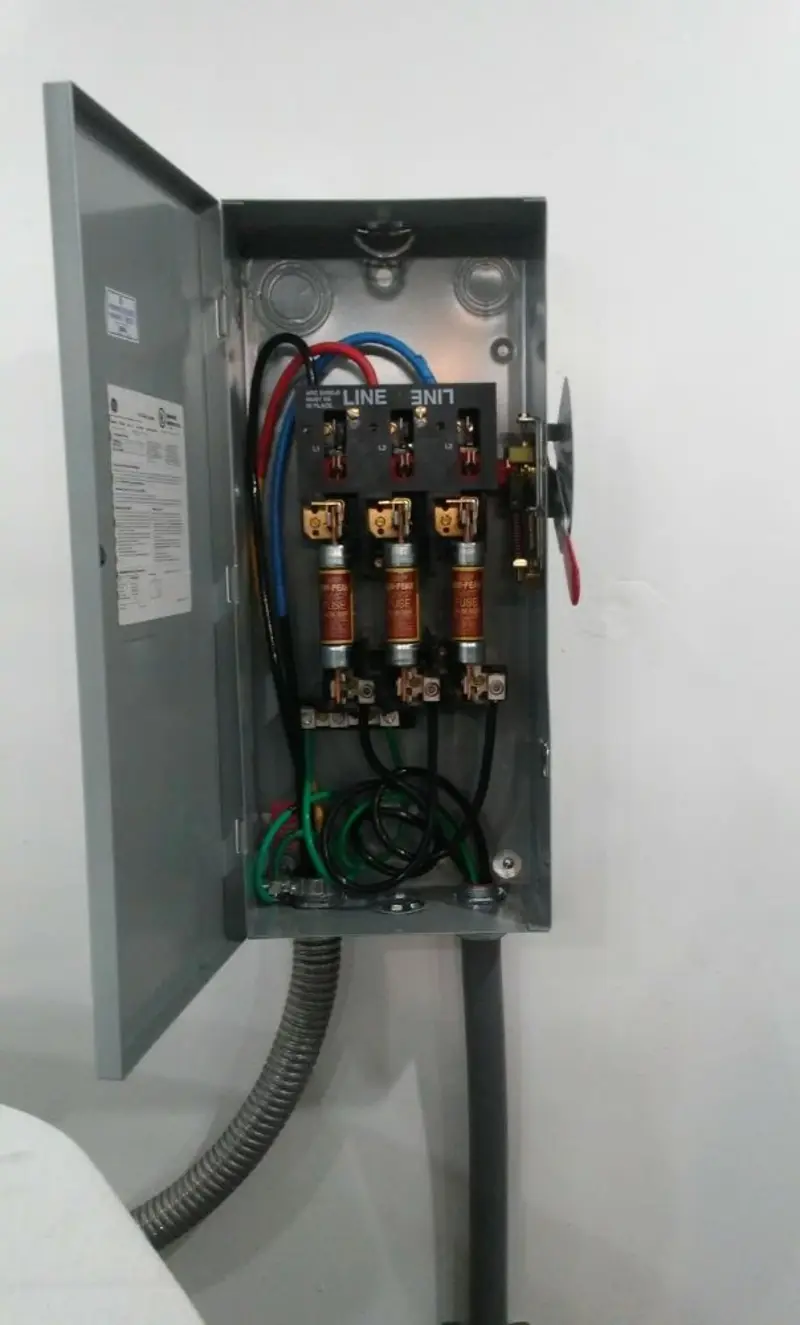 Three-phase disconnect switch installed for Smoke Detector Installation in Grosse Ile